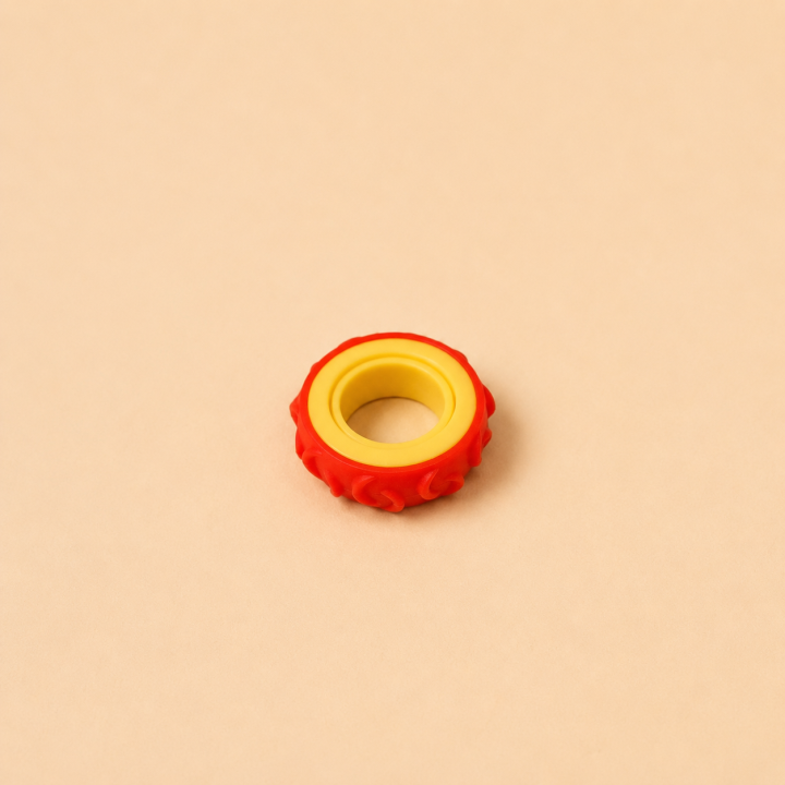 Anneau sensoriel rotatif – Rouge Jaune